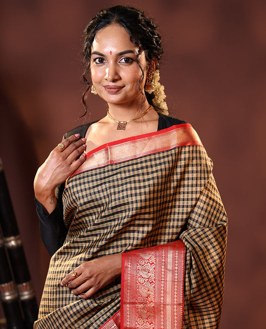 Black Vasundhara Silk Saree Embellished with Checks All Over Its Body, Complemented by Contrast Border of Rekku, Neli, Rudraksham, Kathir, and Mayil Designs, a Grand Pallu of Intricate Designs, and Paired with a Contrast Blouse