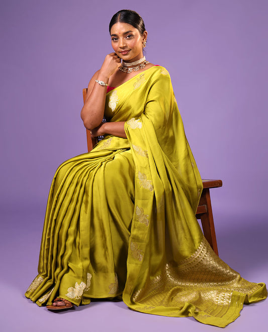 Green mushru silk saree with self floral design border & jaal pallu