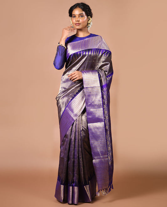 Purple jacquard venkatagiri silk saree with self temple, striped border & jaal design pallu