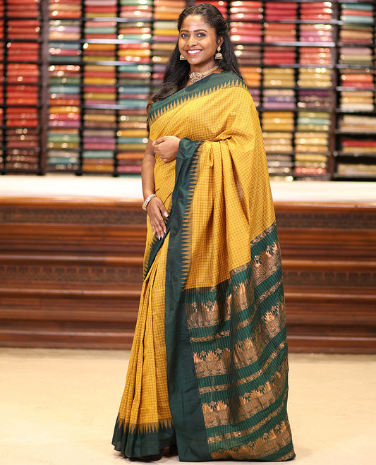 Gold checked kalyani cotton saree with contrast temple border & contrast rich reaving pallu along with contrast blouse