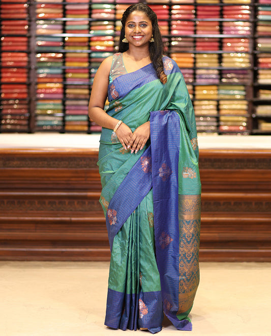 Green zari mango butta design soft silk saree with lotus flower design border & rich weaving pallu along with butta design blouse