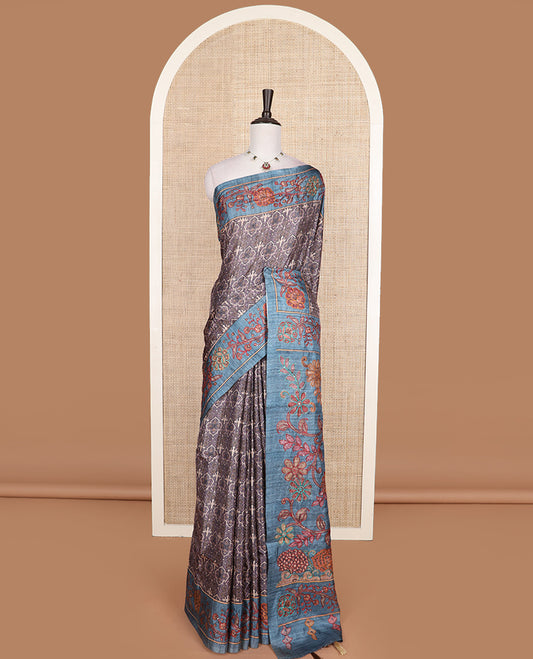 Grey intricately printed tussar silk saree, contrast border and and pallu of floral creeper print with embroidery