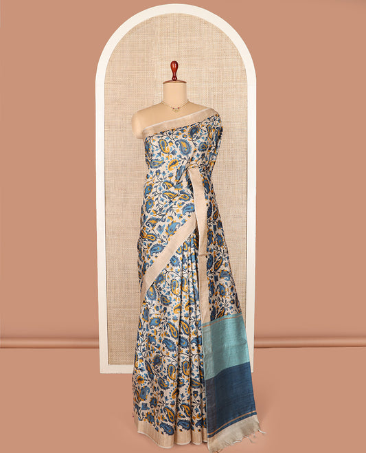 Multi-color floral and paisley motifs tussar silk saree, bavanji border, and double-color plain pallu