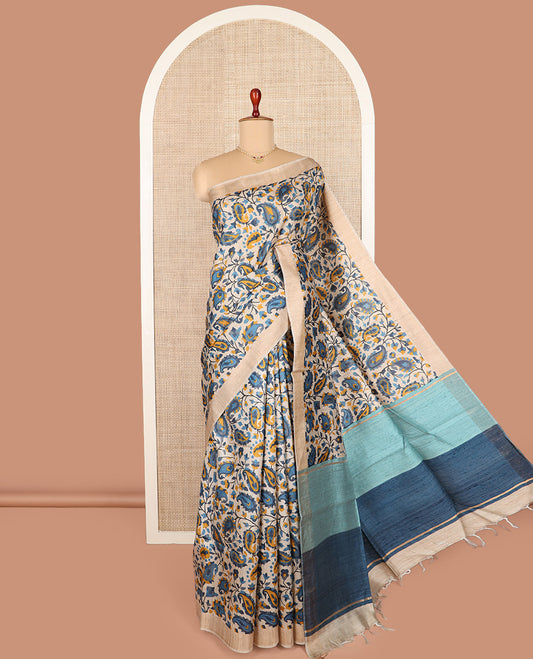Multi-color floral and paisley motifs tussar silk saree, bavanji border, and double-color plain pallu