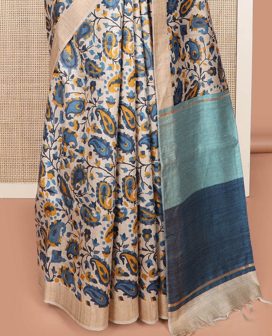 Multi-color floral and paisley motifs tussar silk saree, bavanji border, and double-color plain pallu