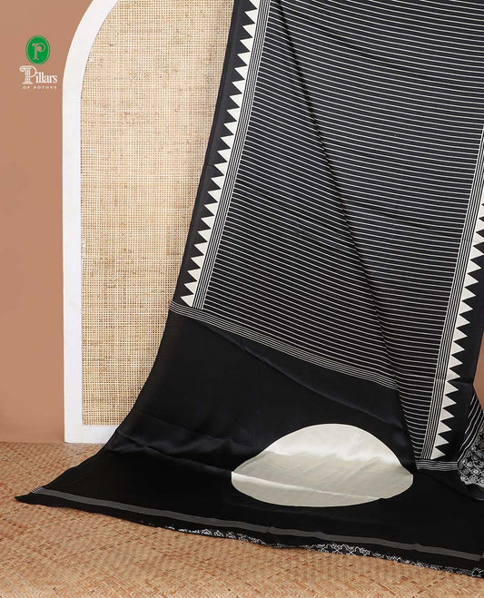 Black with white vertical lining printed design semi modal crepe saree with temple border & circle butta pallu along with printed blouse