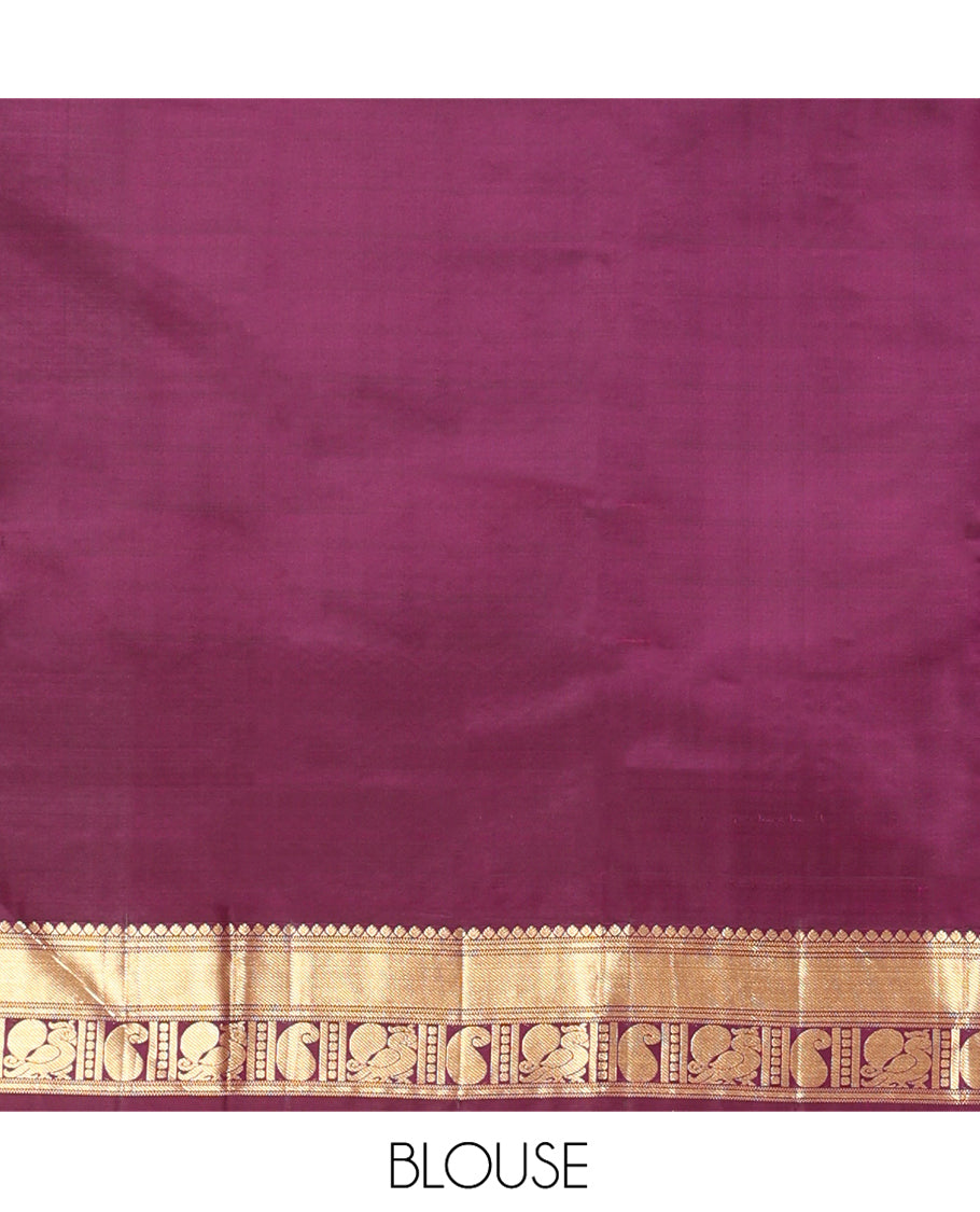 Red Vasundhara Silk Saree, Elevated with Zari Buttas All Over Its Body, Complemented by Contrast Border of Rekku, Manga and Mayil Designs, Grand Jaal Pallu, and Paired with a Contrast Blouse