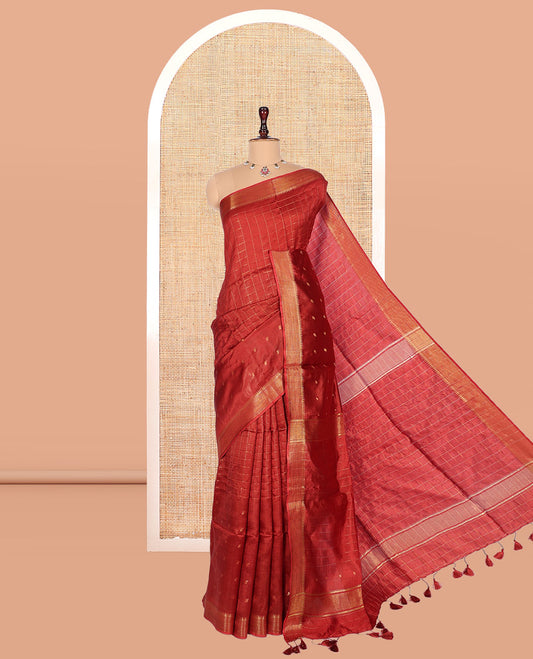 Rust Banana Pith Saree, Gleamed Up with Checks and Buttas, a Zari Temple Border, Striped Pallu, and Matching Blouse