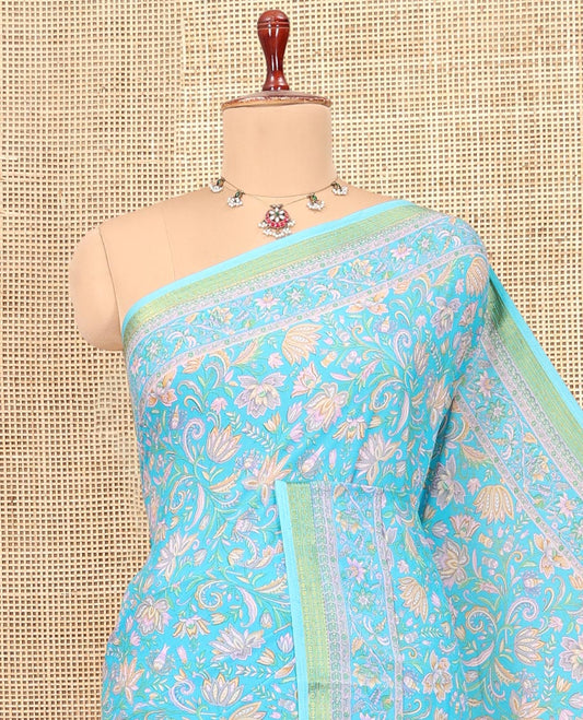 Blue Printed Silk Saree, Prettified with Floral Vine Print, a Zari Border, Floral Print Pallu, and a Matching Blouse