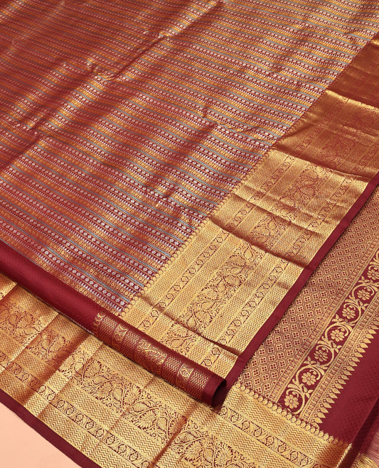 Maroon Kanchipuram Designer Silk Saree, Enriched with Geometric Jacquard Designs, Zari Border of Manga Mokku, Vanki, and Kodi Visiry Designs, Jaal Pallu, and a Matching Blouse