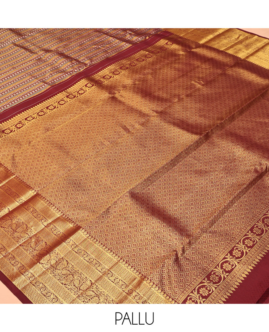 Maroon Kanchipuram Designer Silk Saree, Enriched with Geometric Jacquard Designs, Zari Border of Manga Mokku, Vanki, and Kodi Visiry Designs, Jaal Pallu, and a Matching Blouse