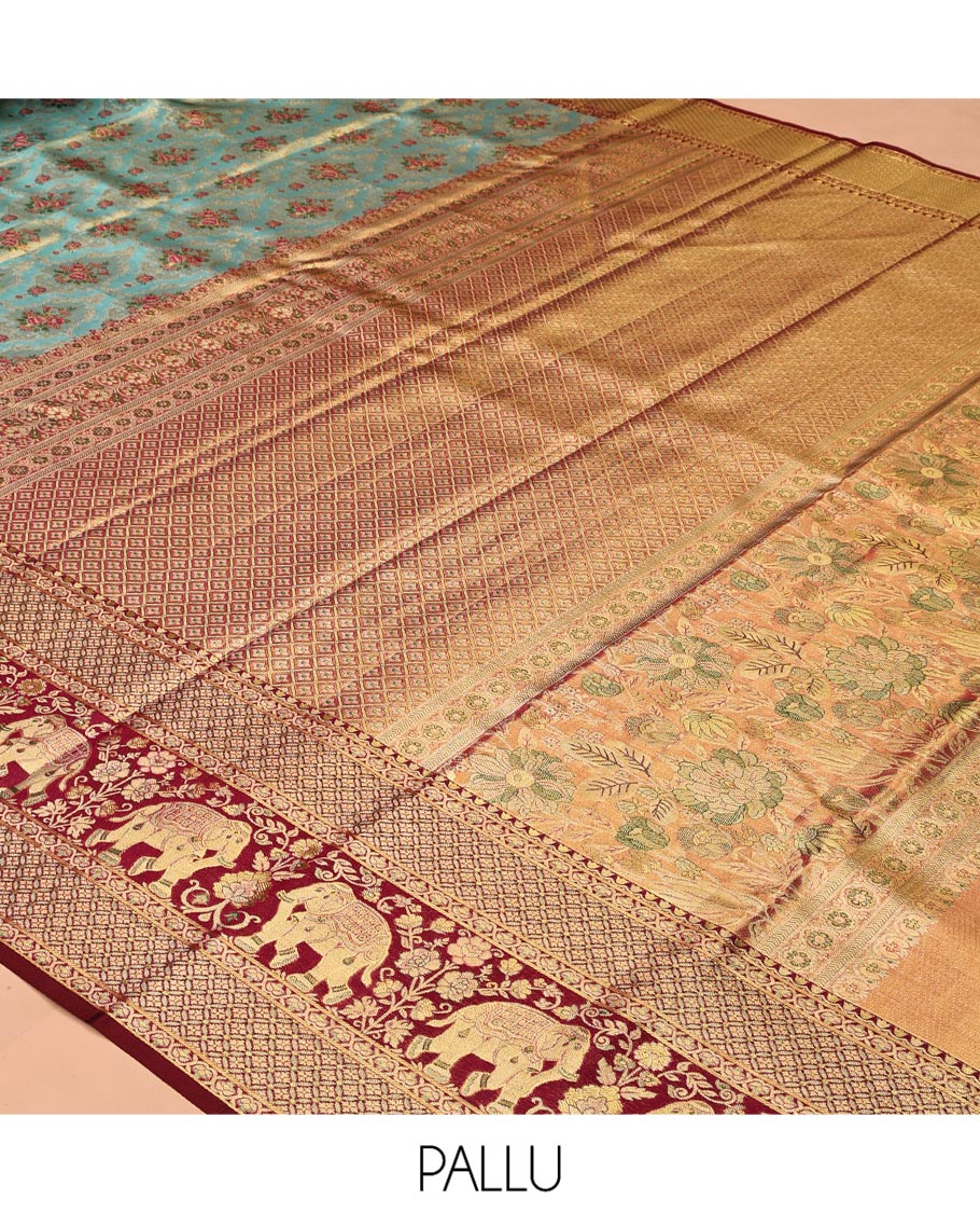 Blue Kanchipuram Tissue Silk Saree, Artfully Detailed with Floral Jacquard, Complemented by a Contrast Border of Jaal and Elephant Designs, Jaal Pallu, and a Contrast Blouse