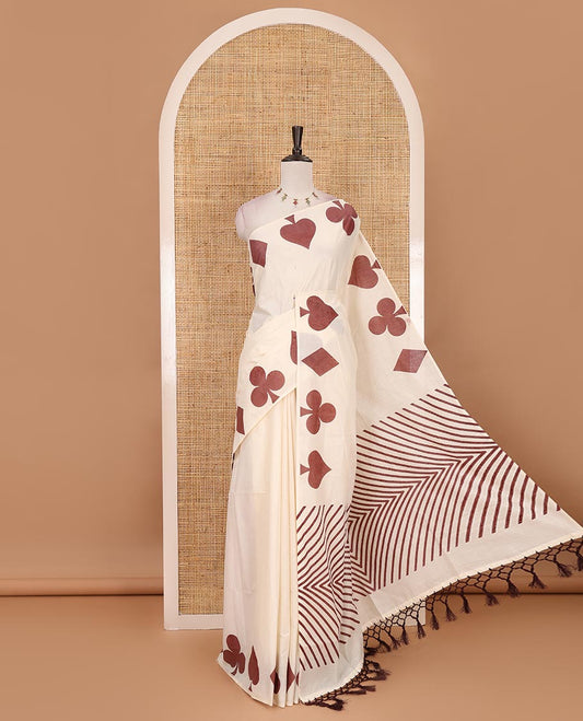 Cream-brown plain Kerala cotton saree, contrast color cards-theme printed border of Diamonds, Clubs, and Spades, leheriya-striped pallu, and plain blouse