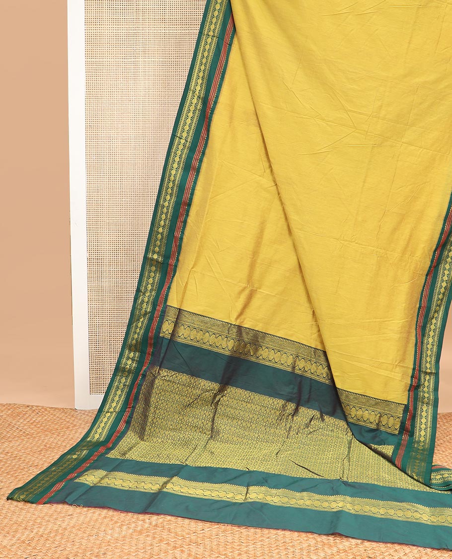 Yellow nine yards cotton saree with contrast zari design border & ogee design pallu