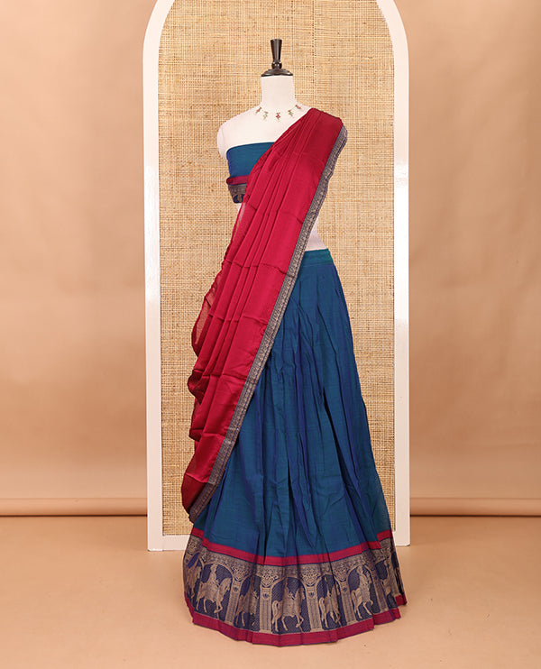 Blue with maroon mercedised cotton half-saree, contrast elephant zari border skirt, matching blouse & one side border georgette dhavani