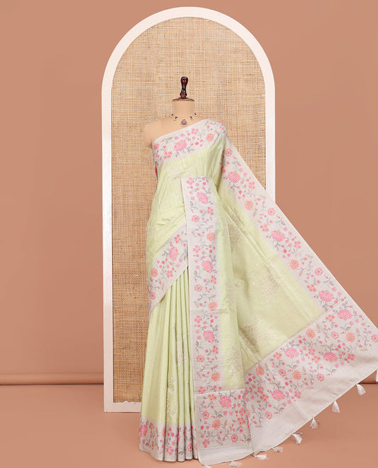 Mint Green Fancy Tussar Silk Saree, Gleamed Up with Zari Buttas, and Applique Embroidery on Its Body, Complemented by a Contrast Temple Floral Creeper Printed Border, Pallu of Floral Creeper Print, and Paired with a Contrast Blouse