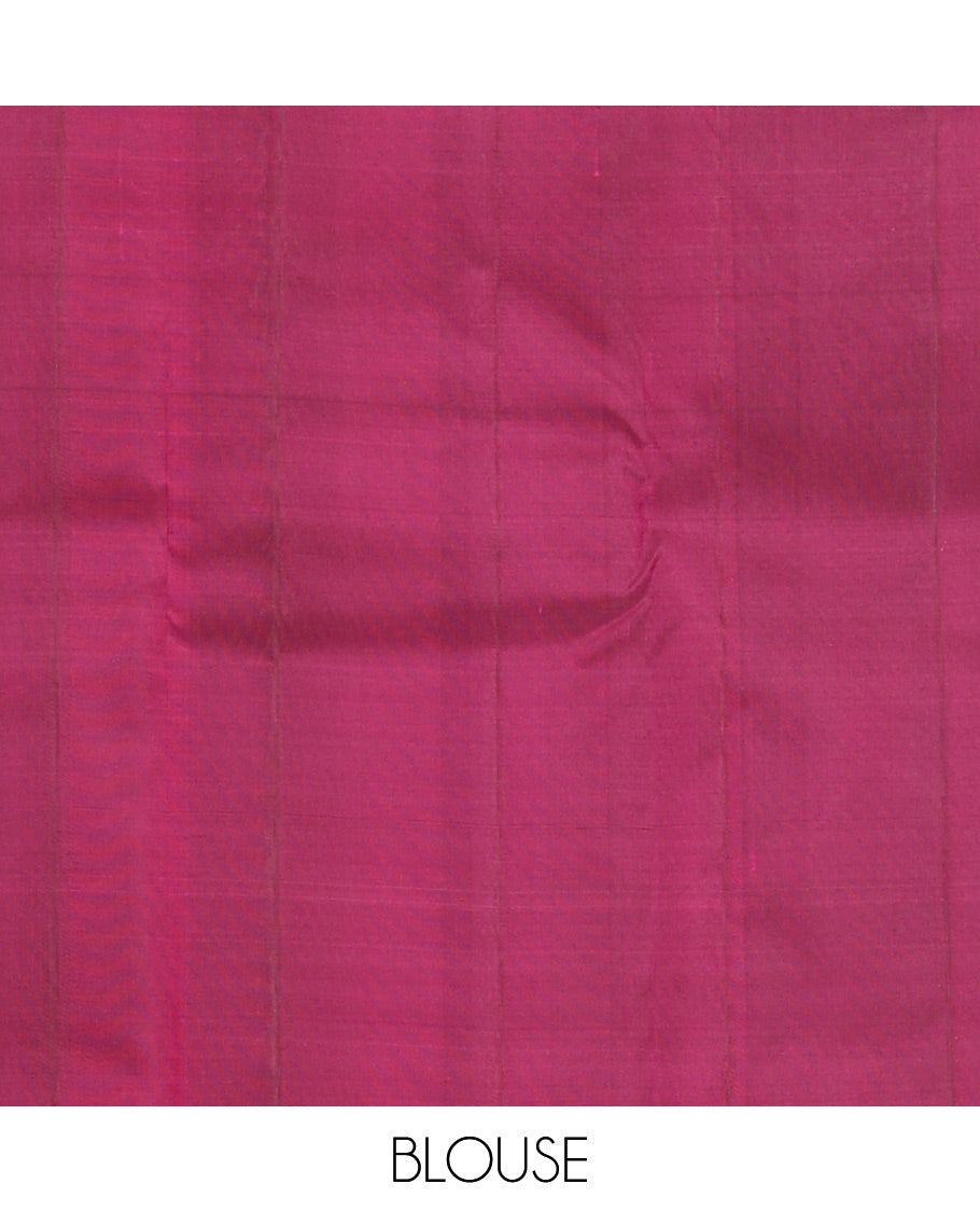 Borderless Purple Vasundhara Silk Saree, Artfully Detailed with Mayil and Chakram Buttas, Grandly Woven Pallu, and a Matching Blouse