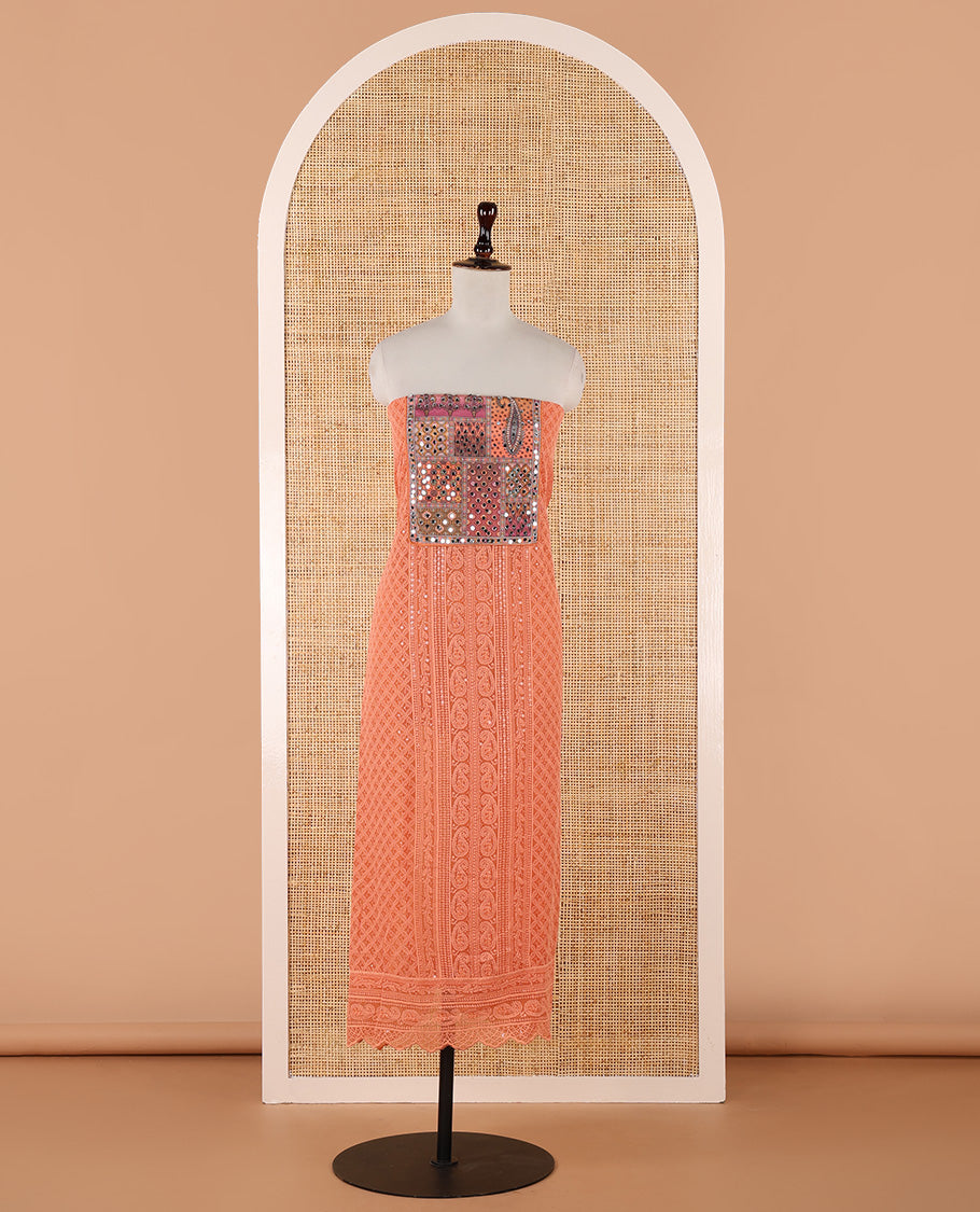 Orange churidar material set, Ajrakh-printed neck with Schiffli embroidery & mirror work georgette top, kalidoscopic-colored dupatta of ajrakh print & mirror embroidery & plain crepe bottom