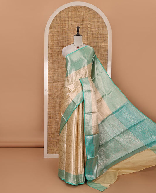 Cream zari jacquard tissue banaras saree, contrast traditional zari design border, intricate pallu & contrast jacquard blouse