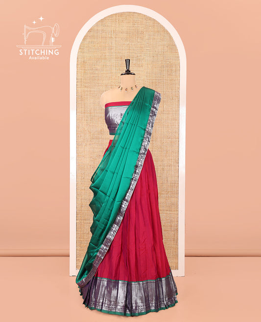 Rani Pink-Green Mercerised Cotton Half-Saree Features Plain with Contrast Traditional Zari Bordered Skirt, Paired with a Matching Blouse, and Comes with a Contrast Bordered Dhavani