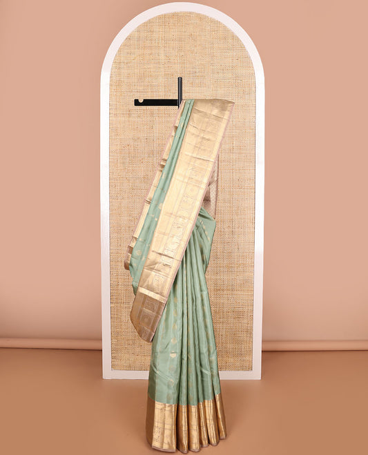Mint green floral design vasundhara elite silk saree with contrast zari design border & checked floral design pallu