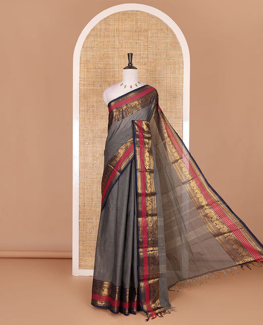 Grey plain Chettinad cotton saree, contrast rettai rettu annam and temple motif zari border, striped pallu, and matching blouse