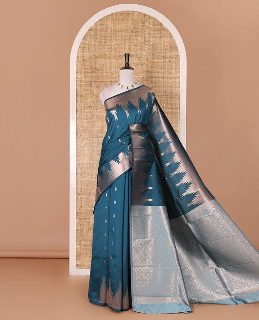 Blue zari buttas kanchi silk saree, temple zari border, zari-rich jaal pallu, and zari motifs woven blouse