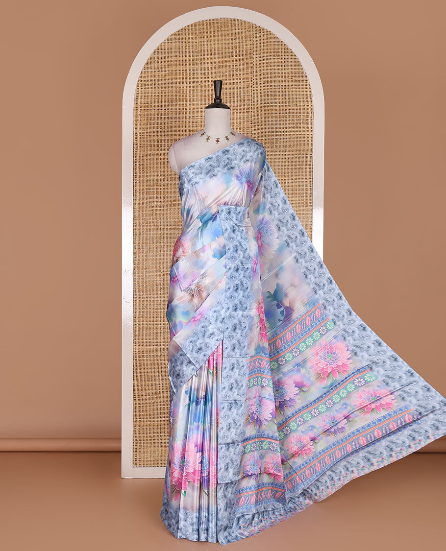 Blue colorful, floral printed turkey crepe saree, floral printed border, pallu, and contrast flower motifs printed blouse