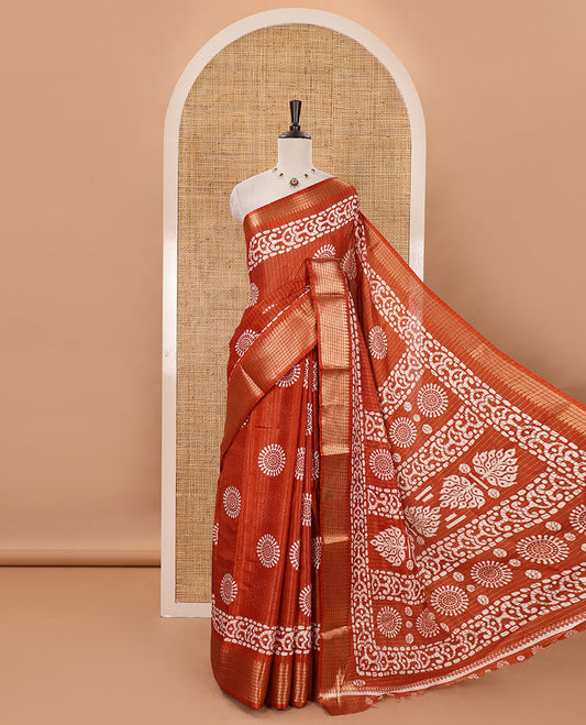 Honey color golden zari striped & batik-printed dola silk saree, traditional zari border & batik printed pallu & matching batik printed blouse