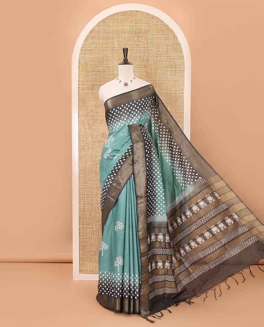 Ramar green batik printed Bhagalpuri cotton saree, contrast gold zari diamond-patterned border, printed pallu & pink blouse of print & zari work