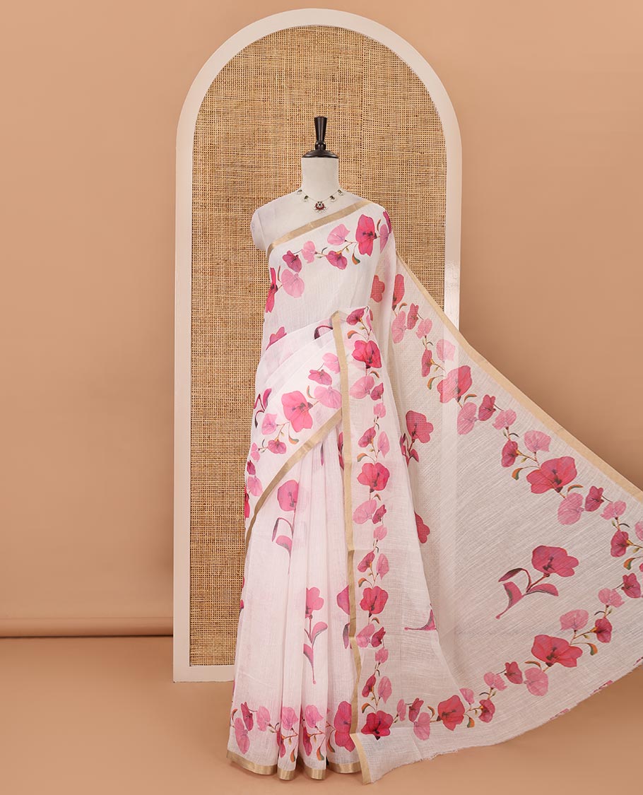White-base pink color floral creeper printed linen saree, zari piping border, floral creeper print pallu & floral print blouse