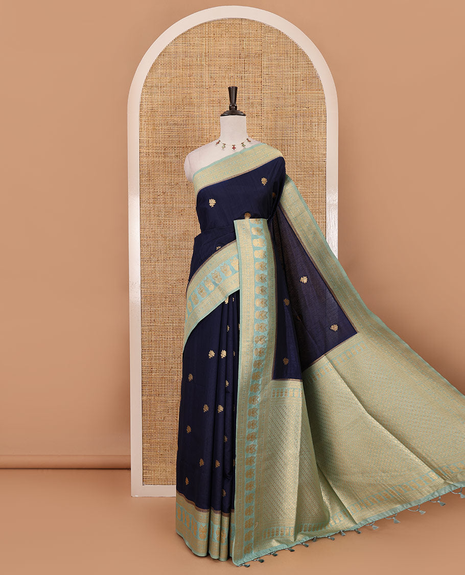 Navy blue peacock buttas dola silk saree, contrast rudraksham & iruthalai pakshi border, intricate pallu & contrast jacquard blouse