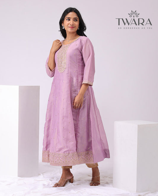 Twara lavender floral embroidered round neck , 3/4 th sleeve , bleow knee lenght a - line kuti with straight pants