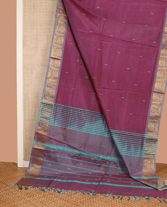 Wine Banana Pith Saree, Embellished with Thread Buttas All Over Its Body, Complemented by a Contrast Floral Creeper Design Woven Border, Pallu Steeped with Stripes and Buttas, and Paired with a Contrast Blouse