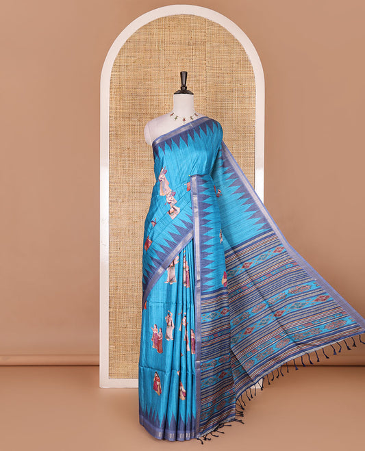 Dark blue Radha motifs printed katan silk saree, contrast temple border, ikkat motifs woven pallu, and contrast printed pallu