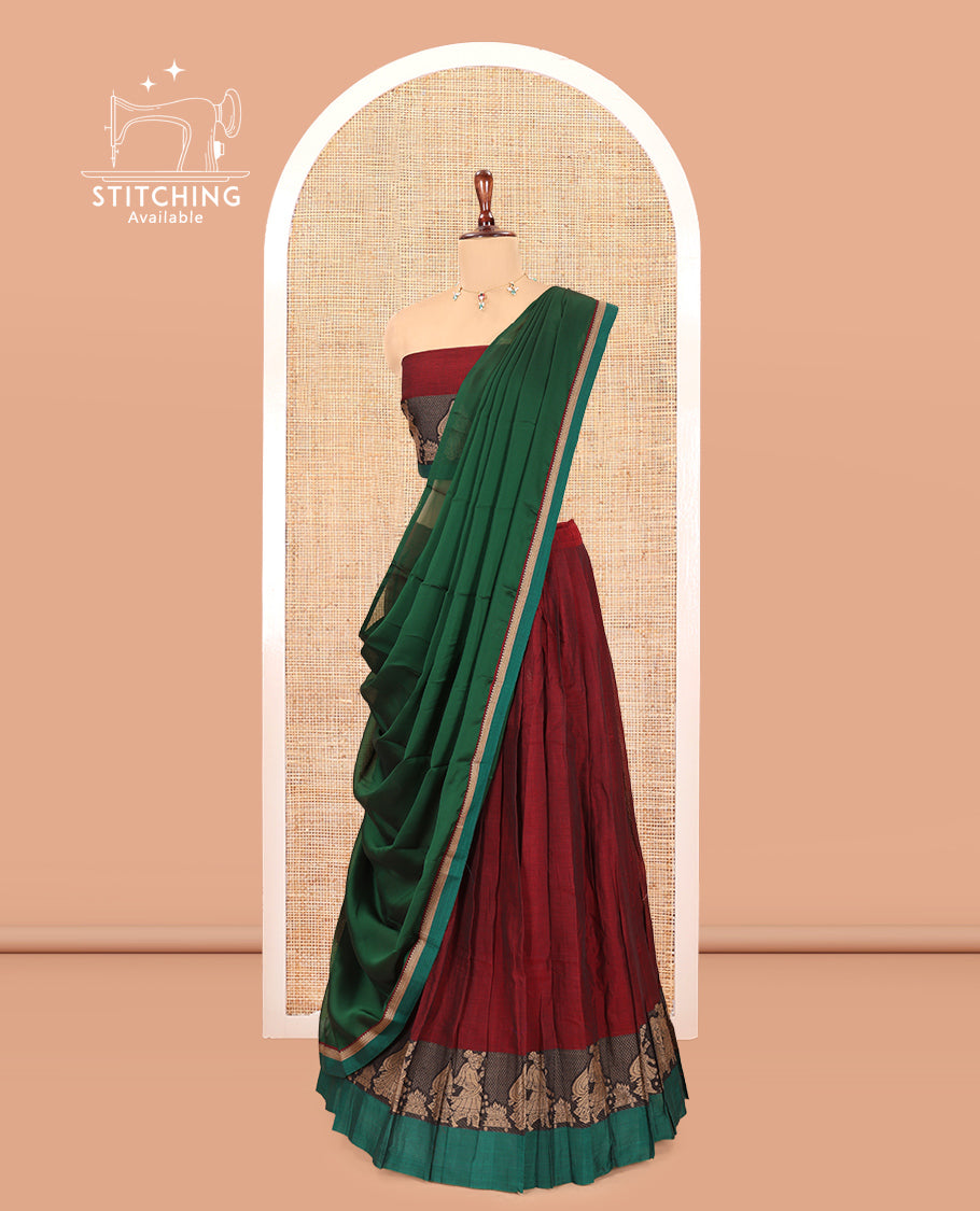 Maroon Mercerised Cotton Half-Saree Features a Plain Skirt, a Contrast Wedding-Themed Border, a Matching Blouse, a Contrast Dhavani