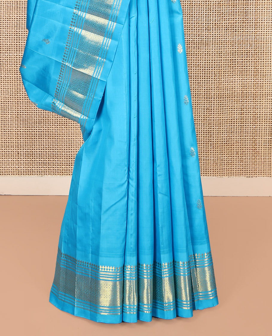 Blue Kanchipuram Silk Saree, Ornamented with Zari Buttas, Highlighted by a Zari One-Sided Border of Panner Sombu, Banaras, Muthu, and Jaal Designs, Grand Pallu, and No Blouse