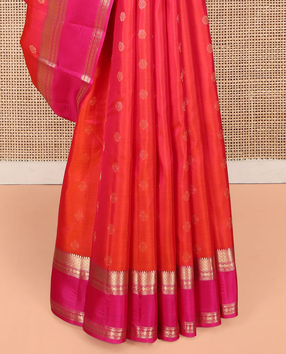 Orange Kanchipuram Silk Saree, Elevated with Zari Buttas on Its Body, Complemented by a Contrast Rettai Pettu Border of Rekku, Mayil Kann, and Kathir Designs, Grand Pallu of Jaal Designs, and Paired with a Contrast Blouse