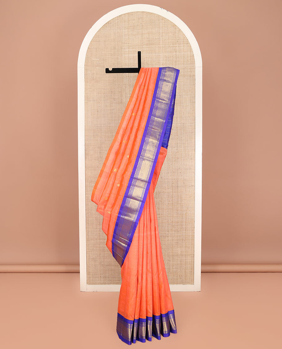Orange Kanchipuram Silk Saree, Decorated with Zari Buttas on Its Body, Complemented by Contrast One-Sided Korvai Border of Panner Sombu, Banaras, and Jaal Designs, Pallu Features Zari Designs, and Comes Without a Blouse