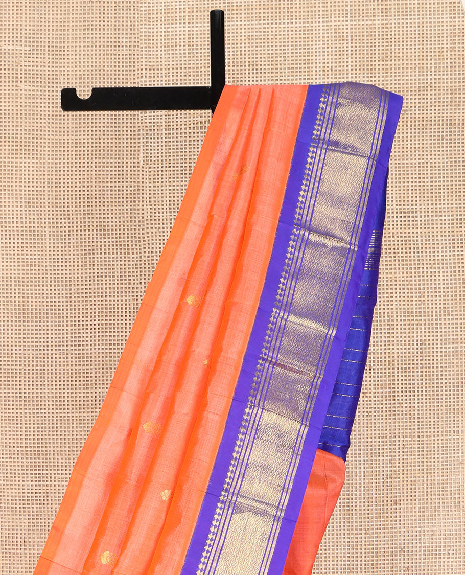 Orange Kanchipuram Silk Saree, Decorated with Zari Buttas on Its Body, Complemented by Contrast One-Sided Korvai Border of Panner Sombu, Banaras, and Jaal Designs, Pallu Features Zari Designs, and Comes Without a Blouse