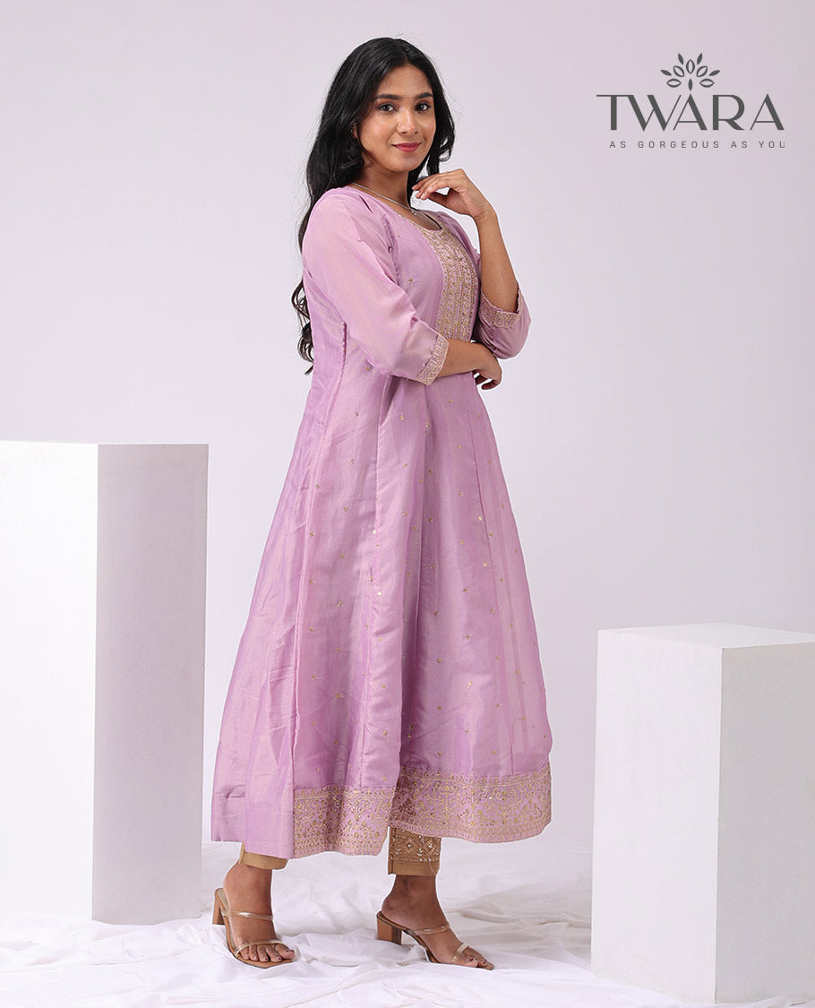 Twara lavender floral embroidered round neck , 3/4 th sleeve , bleow knee lenght a - line kuti with straight pants
