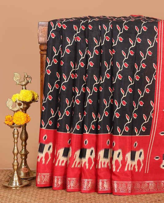 Black floral vine printed Assam cotton saree,contrast border of ikat elephant print & zari peacocks,ikat jaal pallu & ikat print blouse