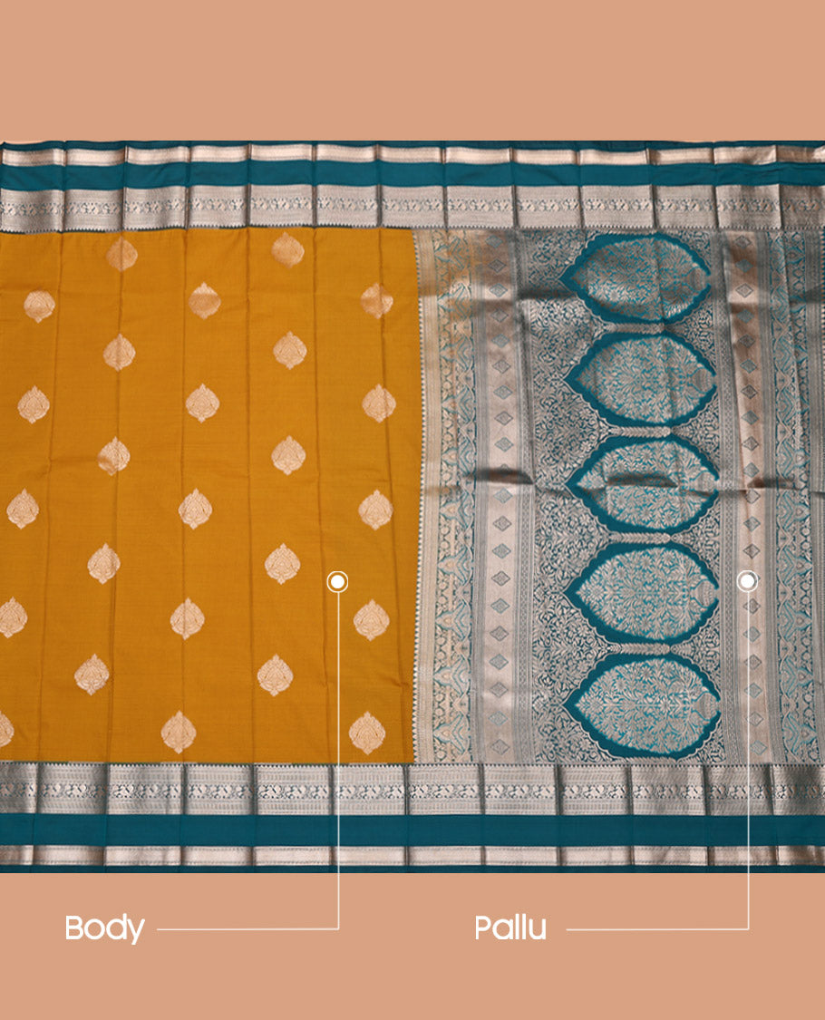 Yellow Budget Silk Saree, Adorned with Zari Buttas All Over Its Body, Complemented by a Contrast Traditional Zari Design Rettai Pettu Border, Grandly Decked Up Pallu, and Paired with a Contrast Blouse