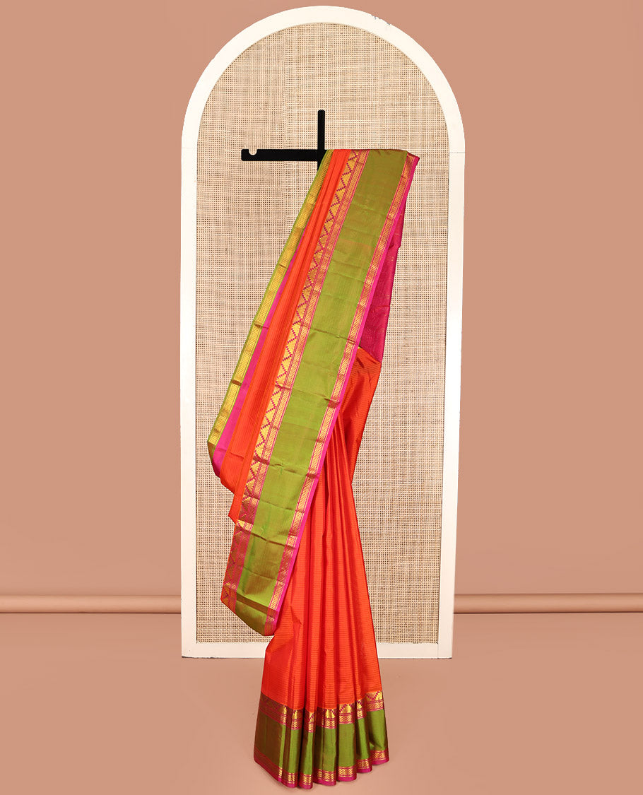Orange Kanchipuram Silk Saree, Sparsely Woven with Vazhai Poo Stripes on Its Body, Complemented by Contrast Rettai Pettu Border of Thazampoo Rekku, and Ara Maadam Designs, Zari-Striped Pallu, and Paired with a Contrast Blouse