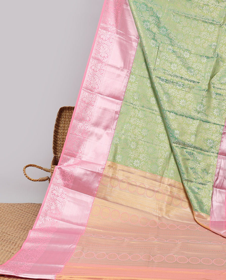 Green jacquard budget silk saree with contrast traditional saree & floral buttas , striped pallu