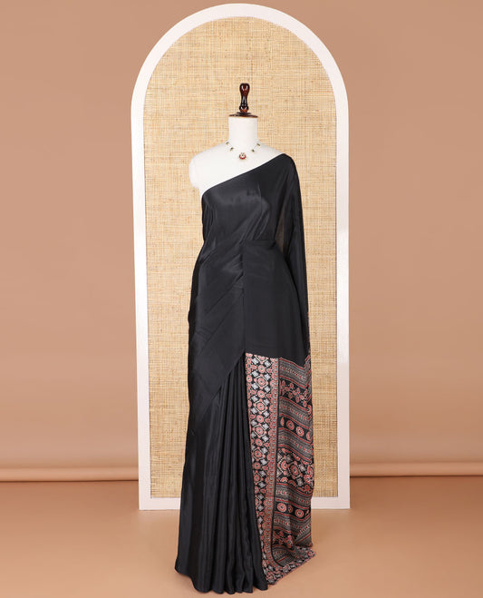 Borderless black turkey crepe saree with ajrakh printed pallu & printed blouse