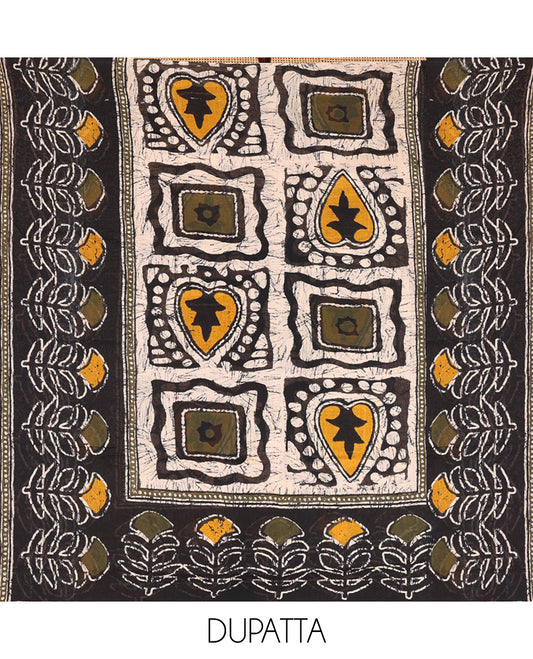 Black-Green Cotton Material Chudidar Features Batik-Printed Top, a Contrast-Printed Bottom, Batik-Printed Dupatta