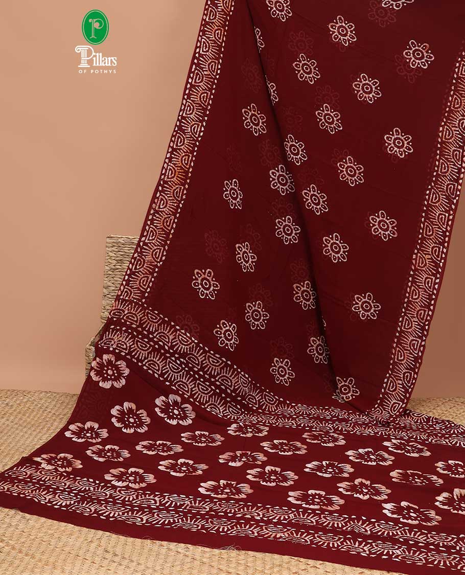 Maroon pathink print georgette saree with pathink print pallu & running blouse