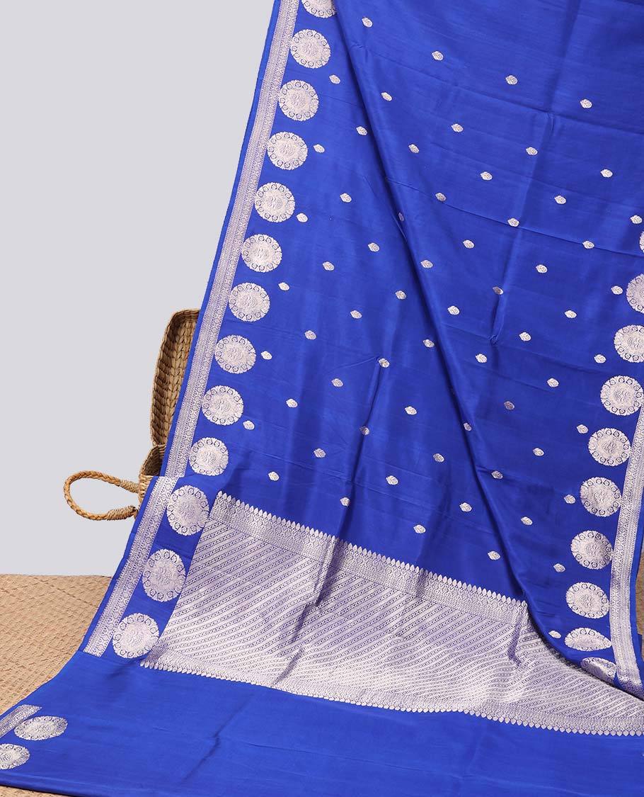 Blue floral buttas raw mango silk saree with self round buttas border & striped zari design pallu
