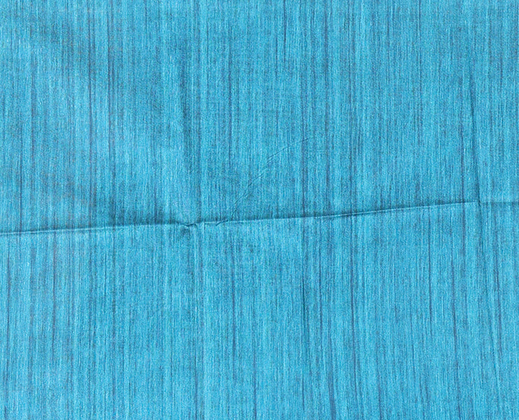 Chikku-rama green plain Khicha katan silk saree, contrast rama green temple border, ikkat printed pallu with tassels, and a contrast blouse